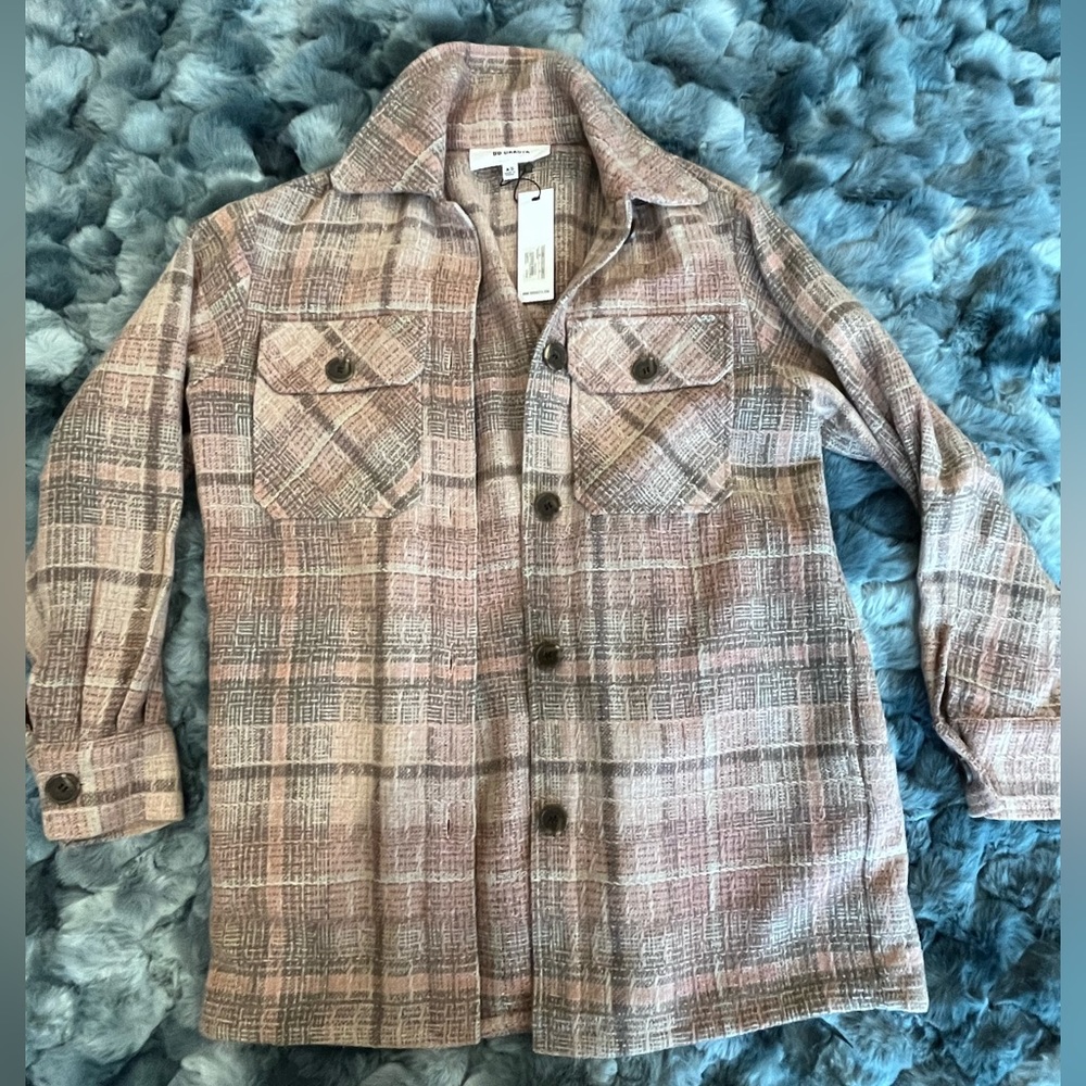 Cute lightweight coat with various shades of muted pink.